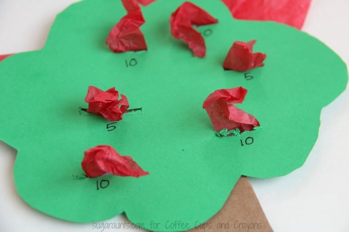 This apple theme math activity is a fun way to practice math facts and develop fine motor skills