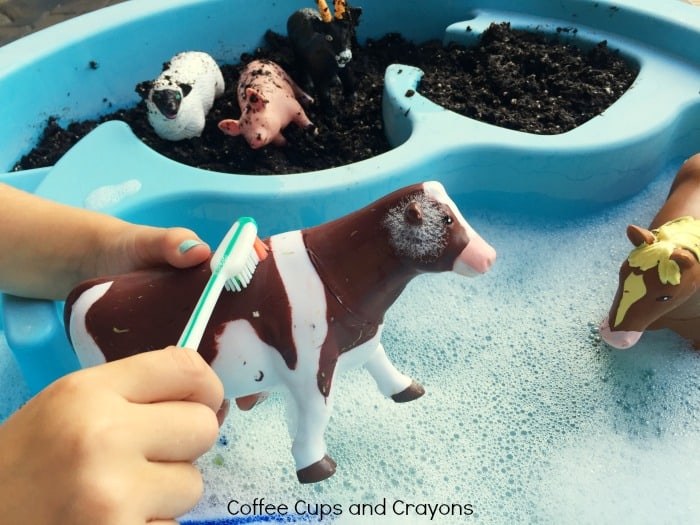 Get-kids-busy-washing-farm-animals-in-this-simple-preschool-sensory-bin.jpg