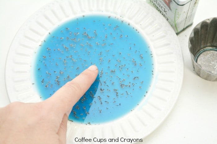 What happens when soap is added to a bowl of water with pepper on it!